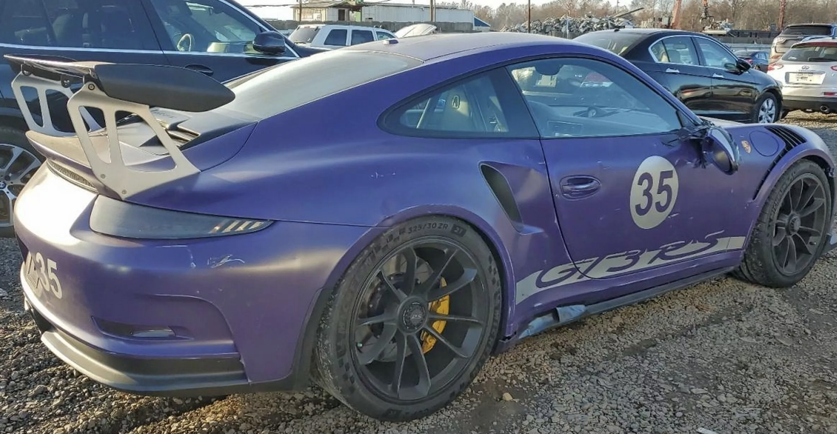 Пошкоджений Porsche 911 GT3 RS у фіолетовому кольорі виставили на аукціон